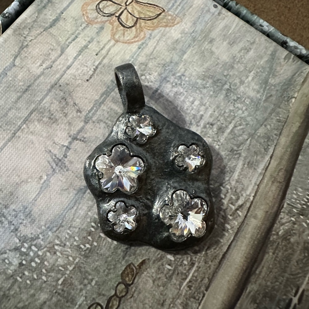 Waxing Poetic pendant.